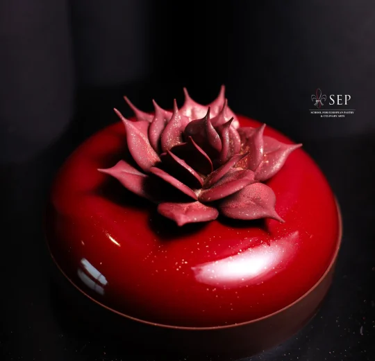 beautiful red sugar cake with flower top